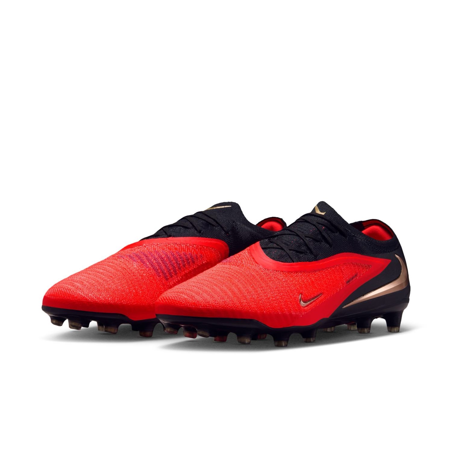 Nike Phantom 6 Low Elite AG red and black artificial-grass soccer cleats with Gripknit upper.