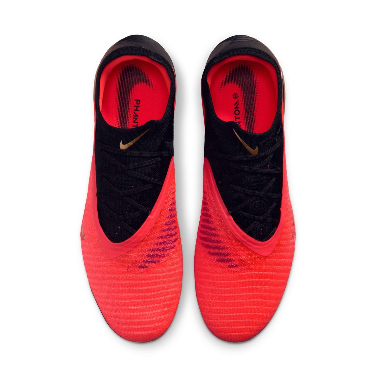 Nike Phantom 6 Low Elite AG red and black artificial-grass soccer cleats with Gripknit upper.