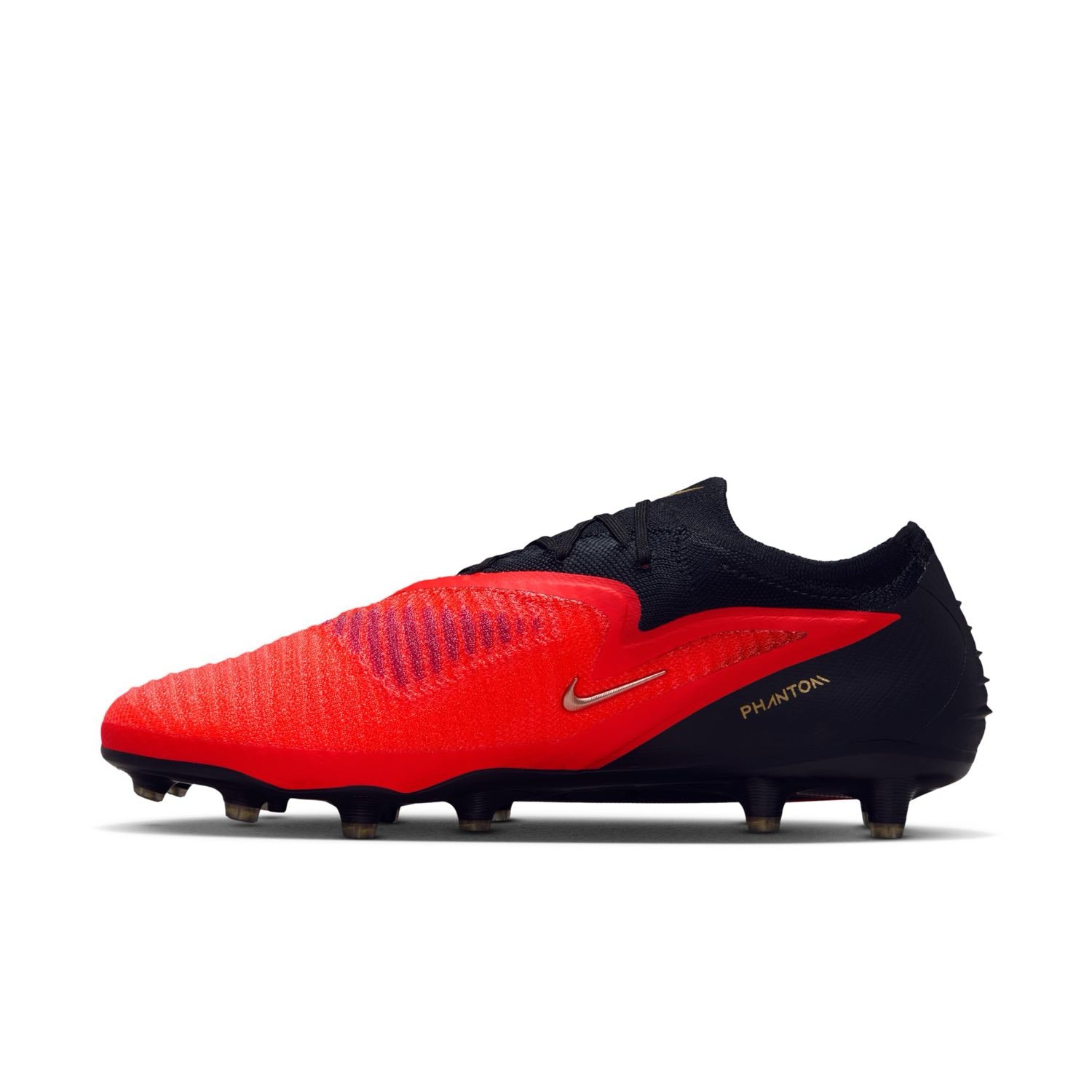 Nike Phantom 6 Low Elite AG red and black artificial-grass soccer cleats with Gripknit upper.