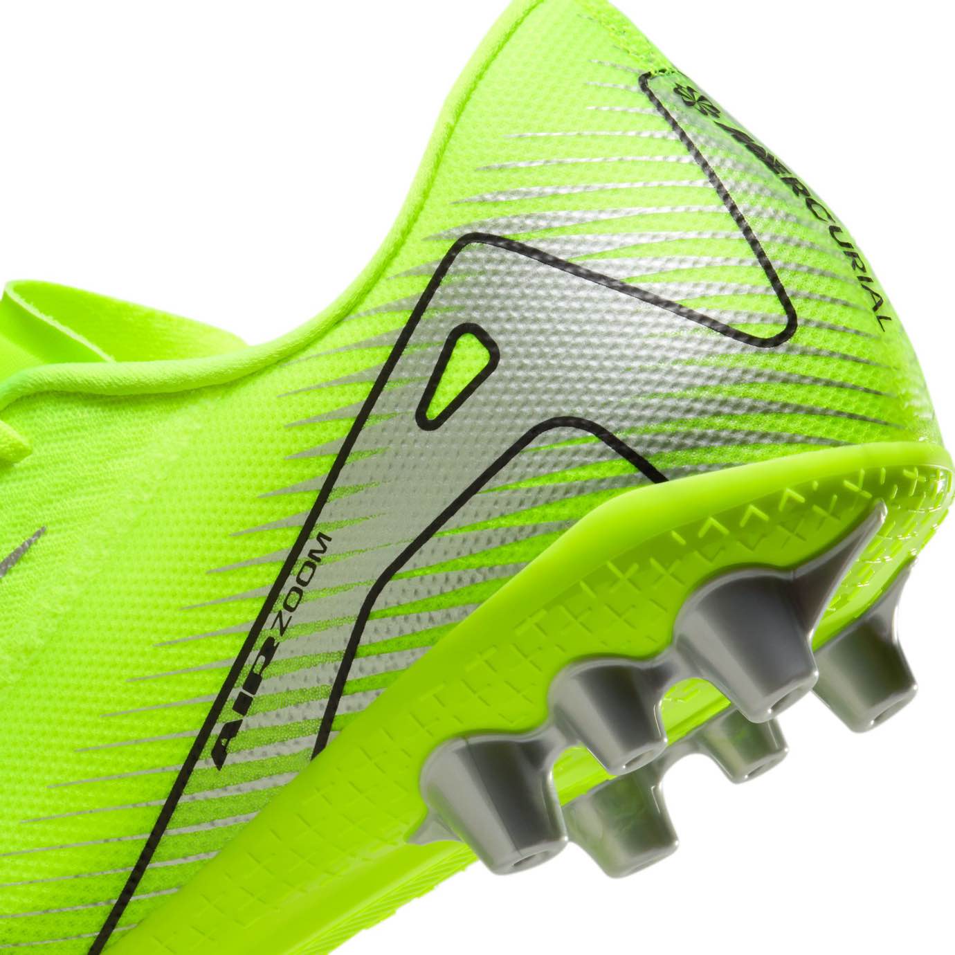 Nike Mercurial Vapor 16 Academy AG - Artificial grass cleats with Air Zoom cushioning, NikeSkin upper for control, and wave-like traction for agility.