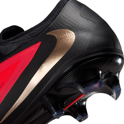 Nike Phantom 6 Low Pro FG red and black firm-ground soccer cleats with VNMSkin upper and Cyclone 360 traction plate.