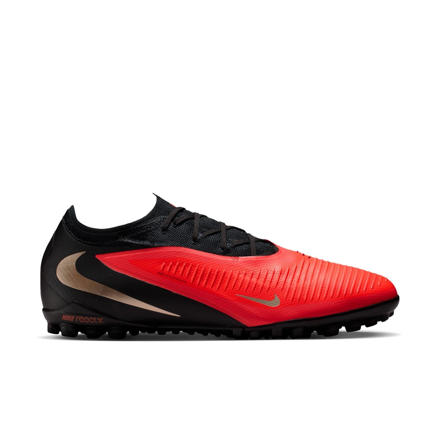 Nike Phantom 6 Low Pro TF red and black turf soccer shoes with VNMSkin upper and rubber outsole.