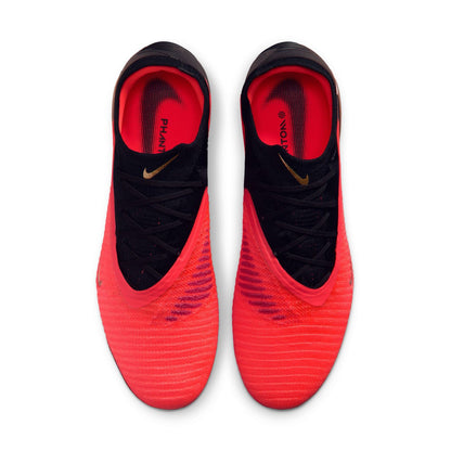 Nike Phantom 6 Low Elite AG red and black artificial-grass soccer cleats with Gripknit upper.