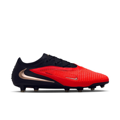 Nike Phantom 6 Low Elite AG red and black artificial-grass soccer cleats with Gripknit upper.