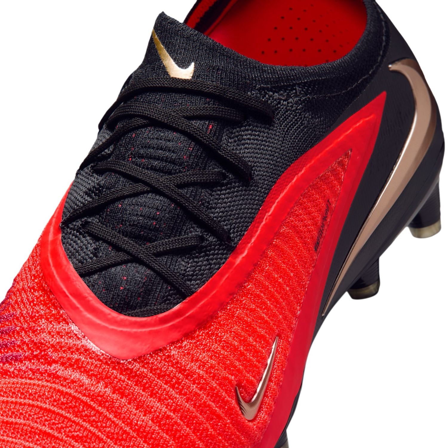Nike Phantom 6 Low Elite AG red and black artificial-grass soccer cleats with Gripknit upper.