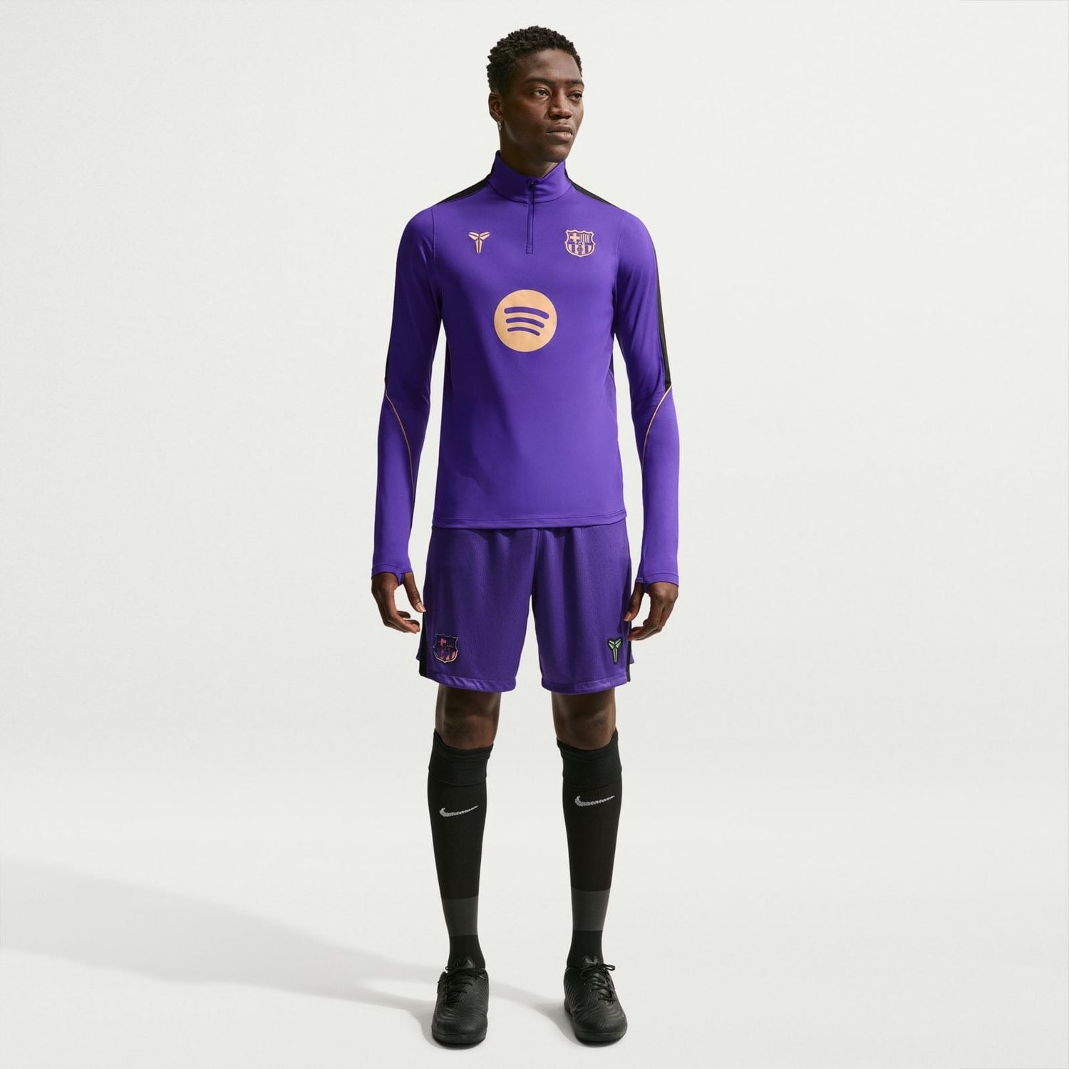 FC Barcelona Strike Away Kobe Dri-FIT soccer drill top in purple.