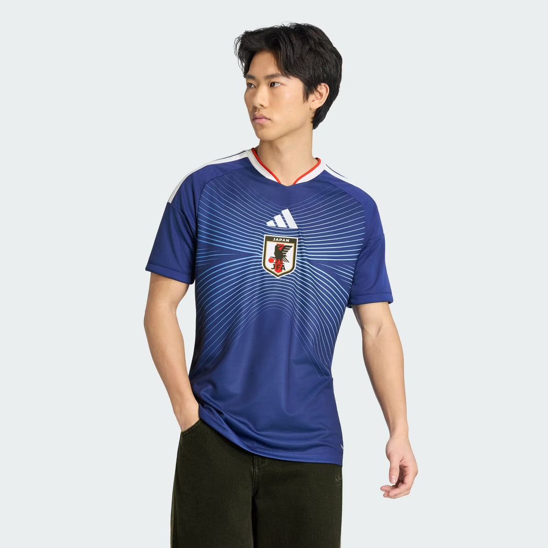 Japan 2026 Home Jersey in blue with official Japan crest and front view on model
