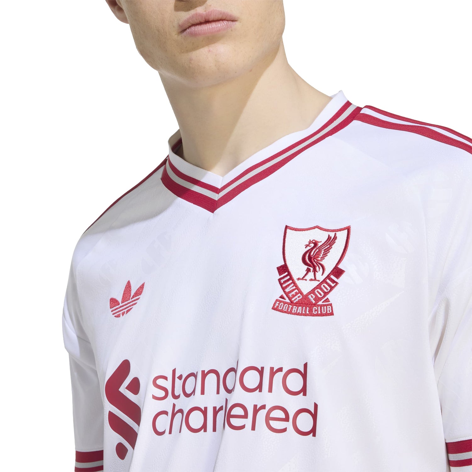 Liverpool FC 26/27 Away Jersey in white with red details, V-neck, club crest and adidas CLIMACOOL technology