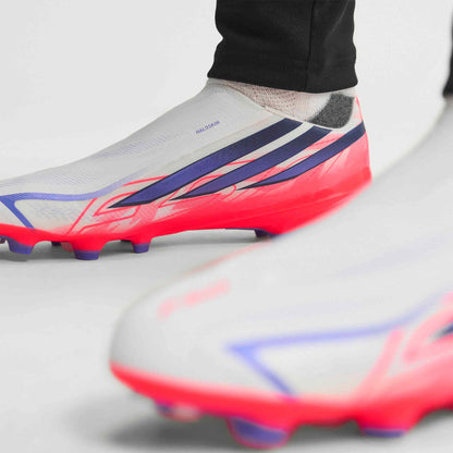 adidas F50 Hyperfast League Laceless FG soccer cleats in silver, navy and pink with firm-ground outsole