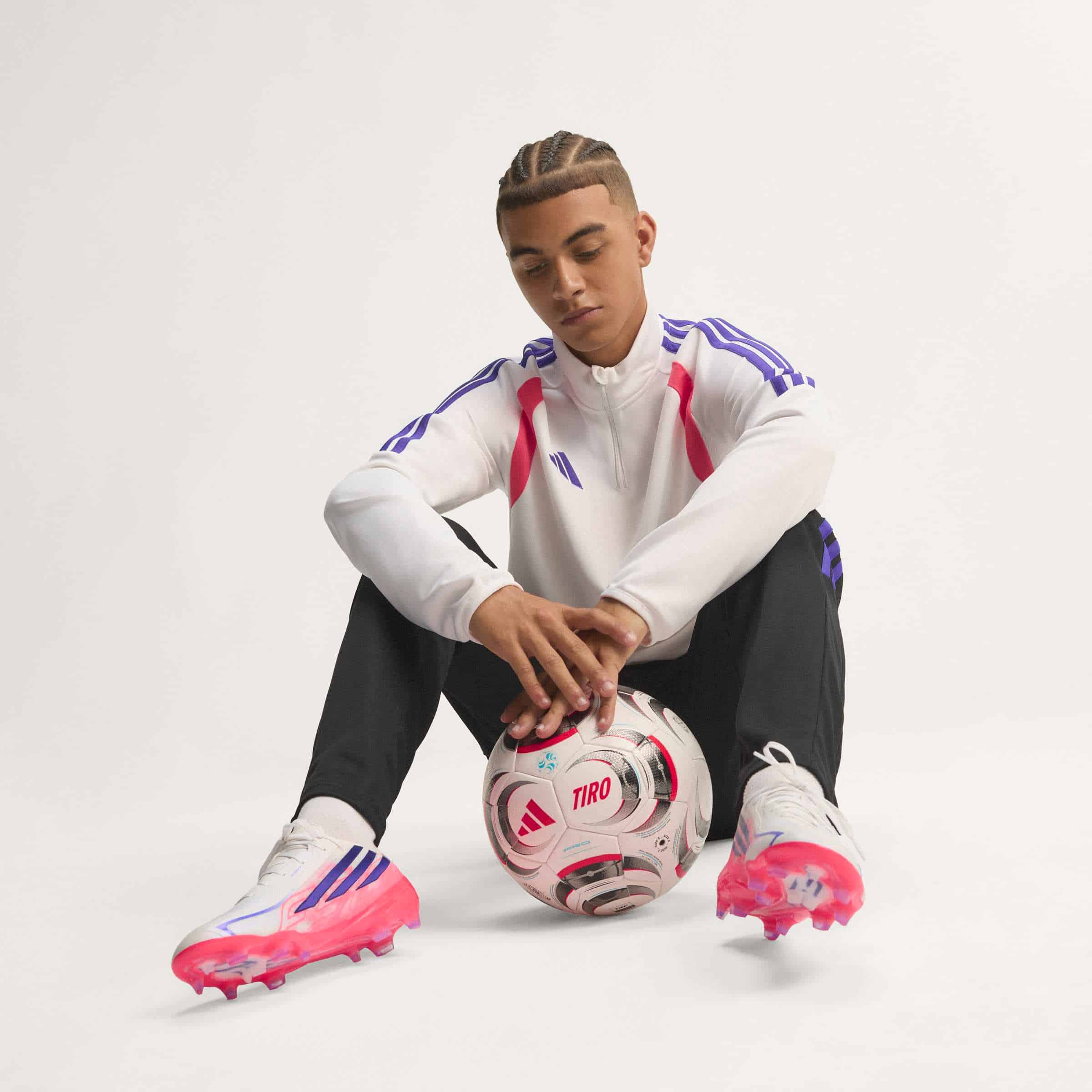 adidas F50 Hyperfast Pro FG soccer cleats in white, pink and navy with firm-ground outsole