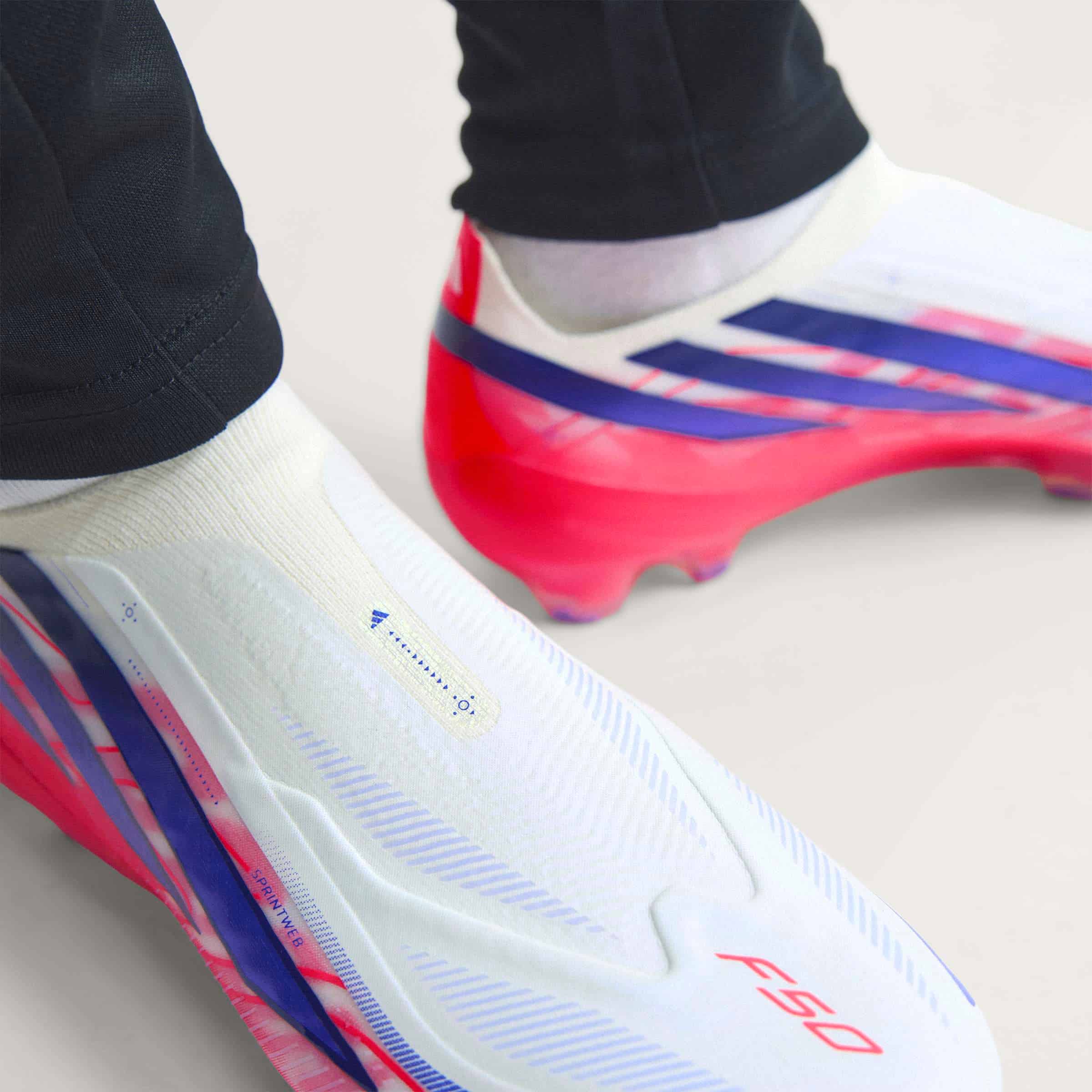 adidas F50 Hyperfast Elite Laceless FG soccer cleats in pink, white and navy with laceless HALOSKIN+ upper