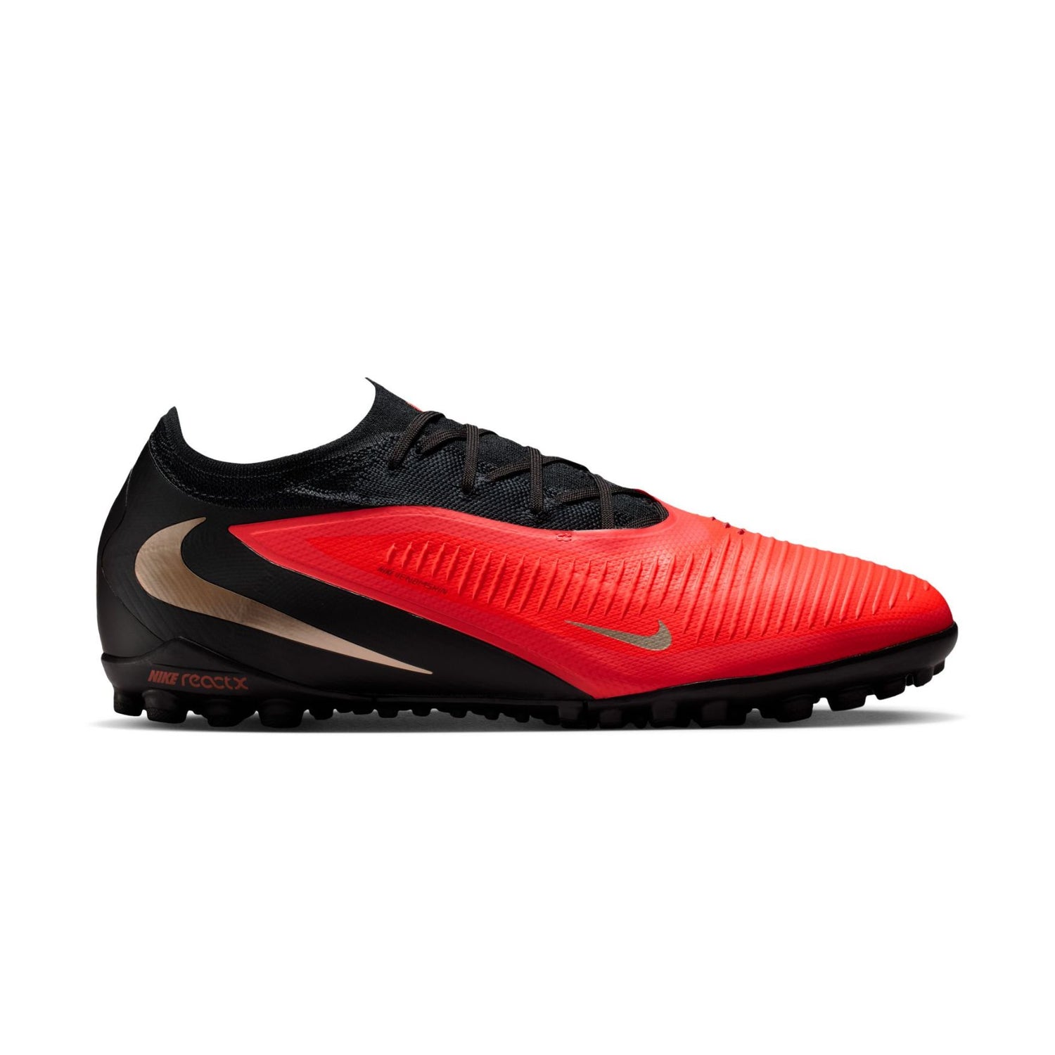 Nike Phantom 6 Low Pro TF red and black turf soccer shoes with VNMSkin upper and rubber outsole.